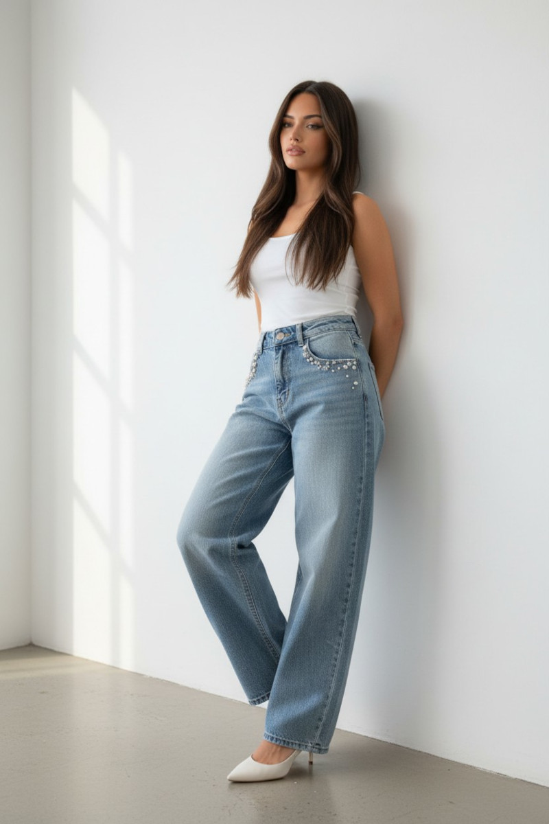 ABBIGLIAMENTO - Jeans con fiorellini di perle