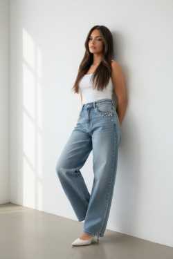 ABBIGLIAMENTO - Jeans con fiorellini di perle